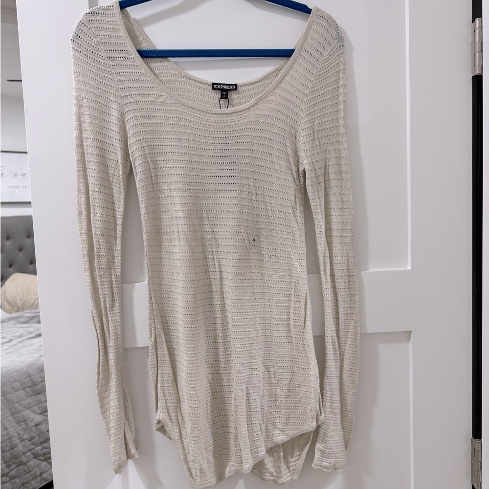 Express long line asymmetrical cream tan top
Size small NWT